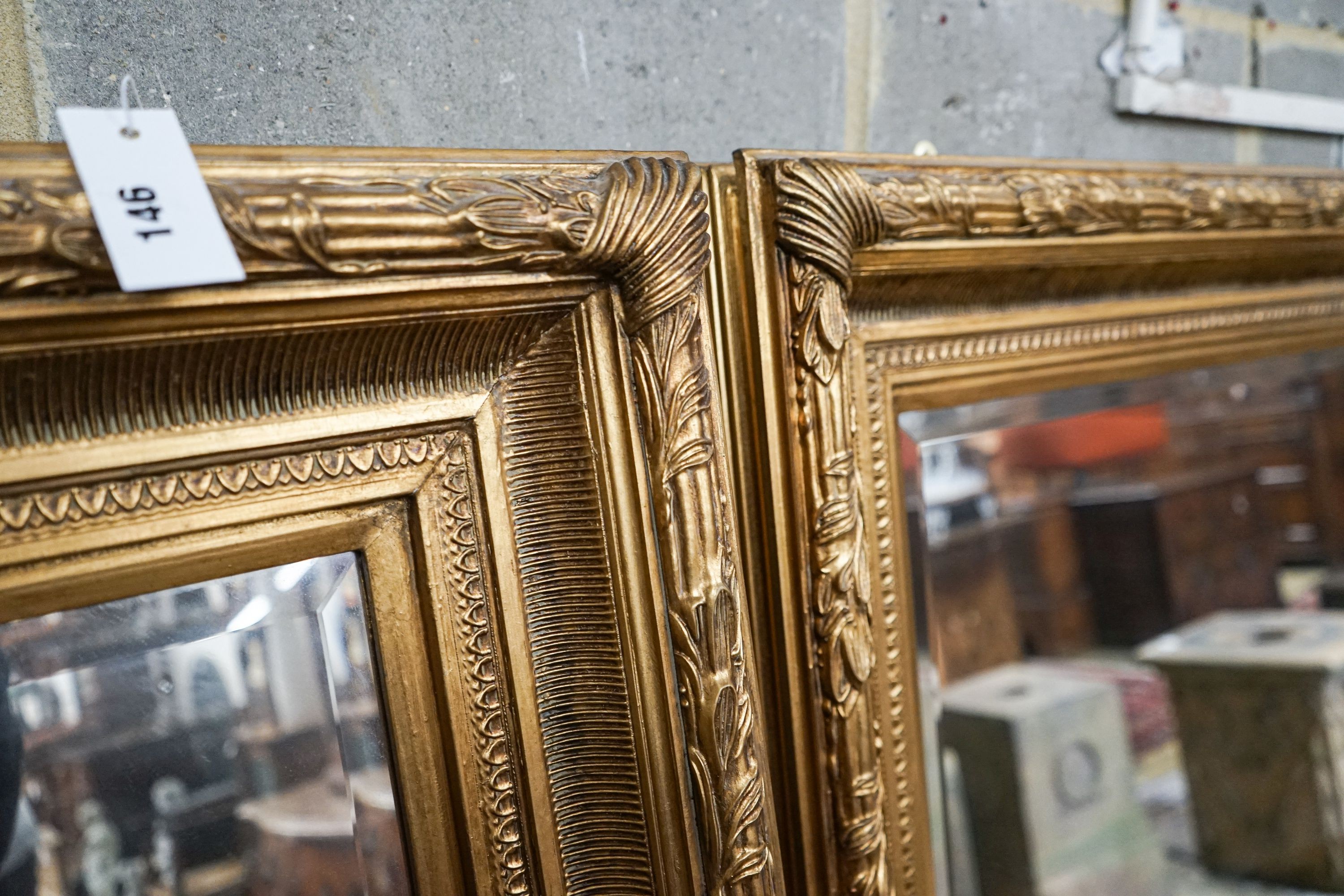 A pair of Victorian style rectangular gilt framed wall mirrors, width 118cm, height 150cm